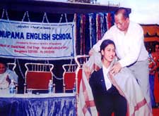 Pratibha being honored by H.T.Sangliana