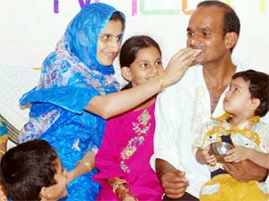 Naeem Sarang with his family