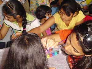 Children painting each other
