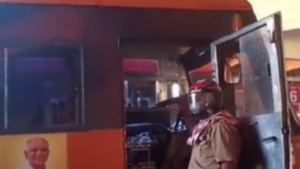 Bus Driver Wearing Helmet In Madikeri Bus Driver Wearing Helmet In Madikeri