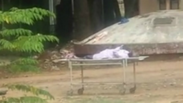 ಮಳೆಯಲ್ಲಿ ಶವ ಬಿಟ್ಟ ಸಿಬ್ಬಂದಿ