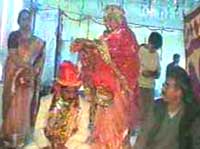 Traditionally dressed up bride and groom