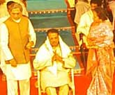 CM honouring H. S. Venkatesha Murthy