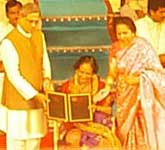 Prema Karanth Receiving Rajyothsava award