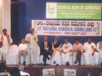 Dr. G.V. Kulkarni speaking at Delhi Kannada Sangha