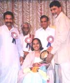Apurva is being felicitated by former Chief Minister of Andhra Chandrababu Naidu