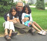 Dr. G.V. with his grand daughters Rtusha and Akshara