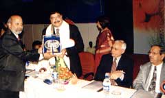 B.R.Shetty geing honoured in Pune for his contribution to Pharmaceutical Congress