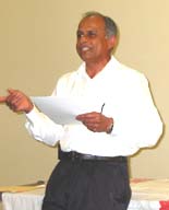Dr. Kusumadhara Gowda delivering his speech on Linguistics