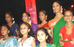Kids holding deepa at WKC 2006